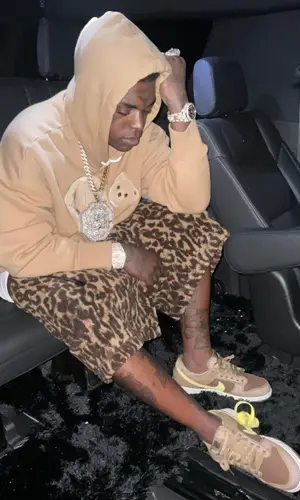 Kodak Black wearing Amiri shorts