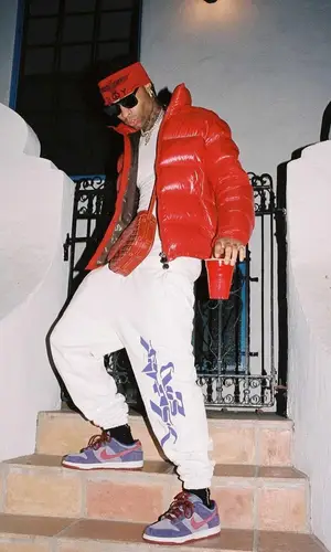 Ronny J wearing Goyard bag