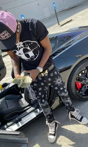 22Gz wearing Chrome Hearts cap