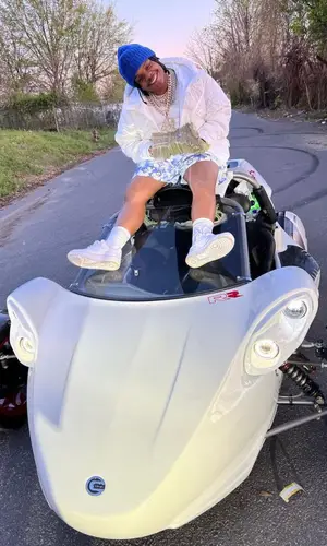 42 Dugg wearing Louis Vuitton jacket