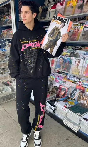 Lil Huddy wearing Spider Worldwide hoody