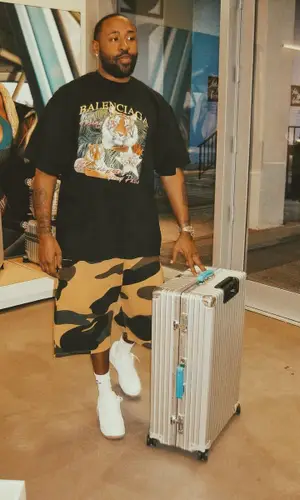 Mike Will Made-It wearing Rimowa bag