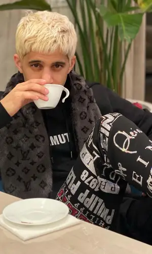 Zahir wearing Philipp Plein pants