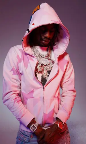 Russ Millions’ Outfit in Places + Faces T-Shirt, Bape Hoodie & Amiri Jeans (2022)