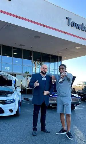 CJ So Cool wearing Louis Vuitton sweatshirt