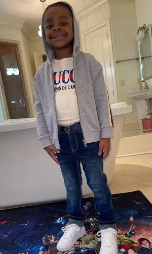 Jason Armani wearing Gucci hoody