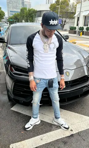Lil Migo wearing Chrome Hearts cap