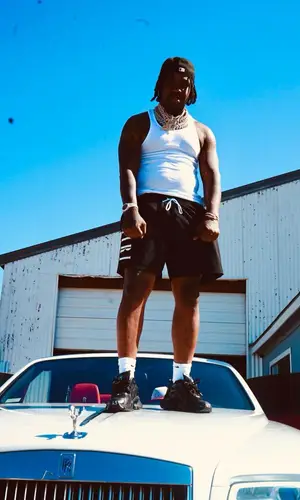 EST Gee wearing Nike sock