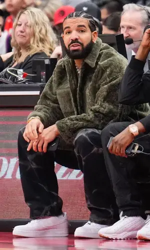 Drake wearing Nike sneakers
