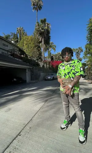 No Cap wearing Dior t-shirt