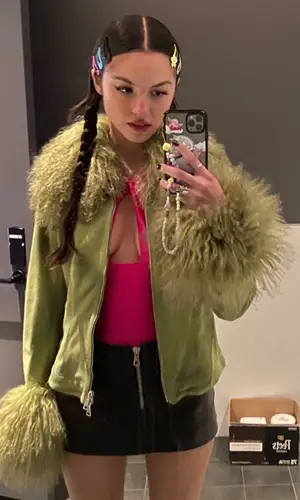 Olivia Rodrigo’s Outfit in Blumarine Jacket, Coperni Top & Casetify (2022)