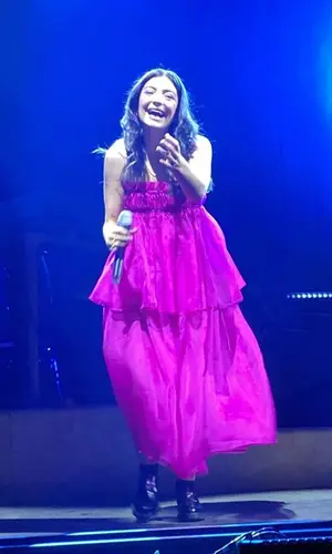 Lorde wearing Prada boots