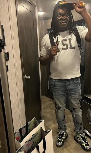 Lucki wearing Saint Laurent t-shirt