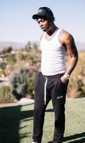 Fredo Bang wearing Amiri cap