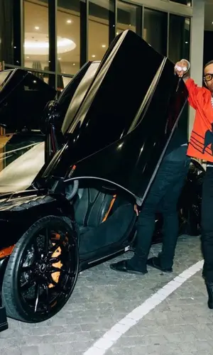Tory Lanez wearing Amiri jeans