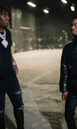 Fredo Bang wearing Amiri jeans