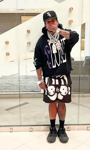 Westside Gunn wearing New Era cap