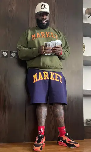 Rick Ross wearing Market shorts
