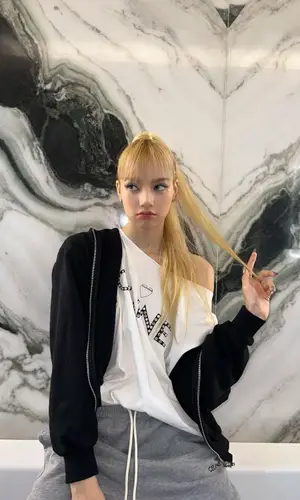 Lisa wearing Celine pants