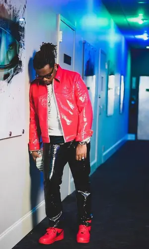 Gunna’s Outfit in Diesel Jacket, Nike Sneakers & Chrome Hearts Eyewear (2022)