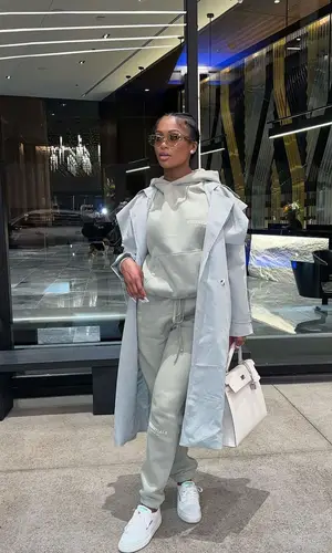 Dess Dior’s Outfit in Fear of God Hoodie, Reebok Sneakers & Hermes Bag (2022)