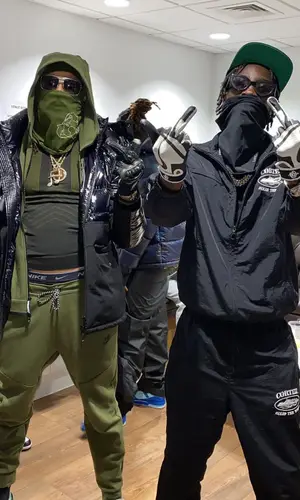 Unknown T wearing Corteiz pants