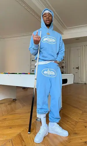 Lundun wearing Corteiz pants