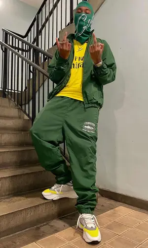 Lundun wearing Corteiz pants