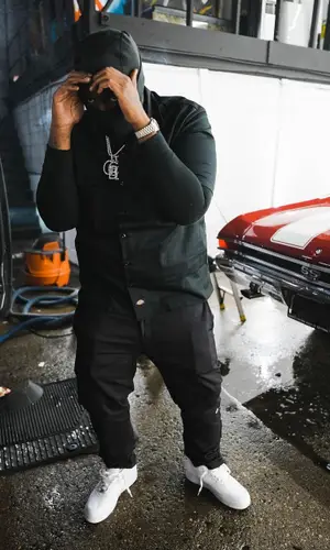 Peezy wearing Dickies pants