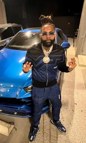 Money Man wearing Versace pants
