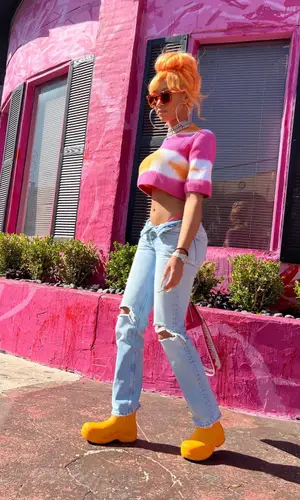 Lakeyah wearing Bottega Veneta eyewear