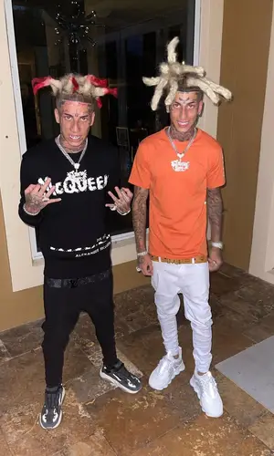 Kodiyakredd wearing MCM belt