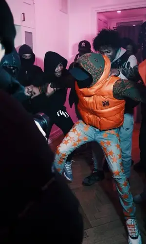 Dougie B wearing Amiri hoody