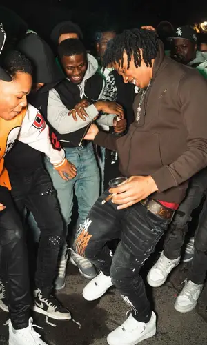 B Lovee wearing Louis Vuitton hoody