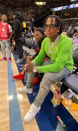 Moneybagg Yo wearing Amiri jeans