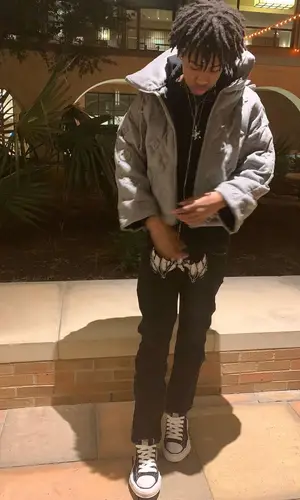 Rich Amiri wearing Louis Vuitton scarf