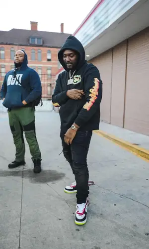 Peezy wearing Marino Infantry hoody