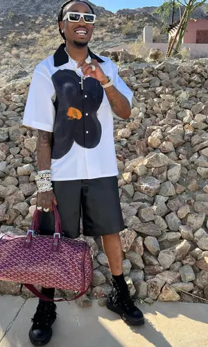 Quavo wearing Bottega Veneta shorts