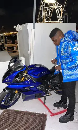 Kodak Black wearing Valentino Garavani boots