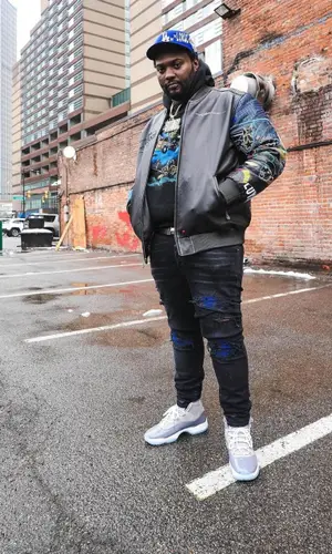 Peezy wearing Hermes belt