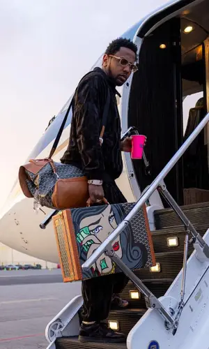 Fabolous wearing Goyard bag