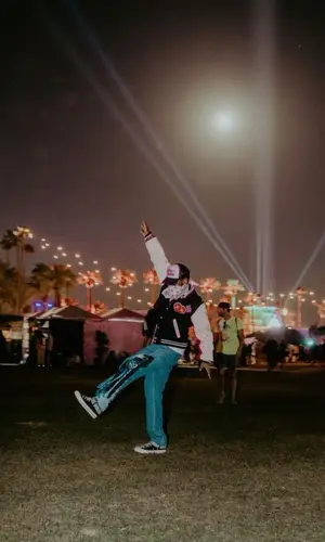 Big Sean’s Outfit in Human Made Jacket, Lanvin Jeans &   Kaws (2022)