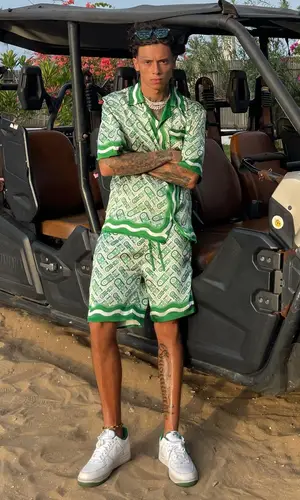 Central Cee wearing Casablanca shorts