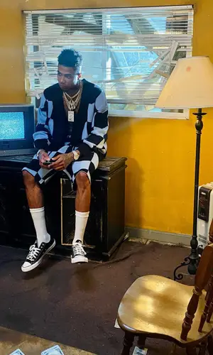 Blueface’s Outfit in Keiser Clark Sweater, Converse Sneakers & Odd Sox Underwear (2022)