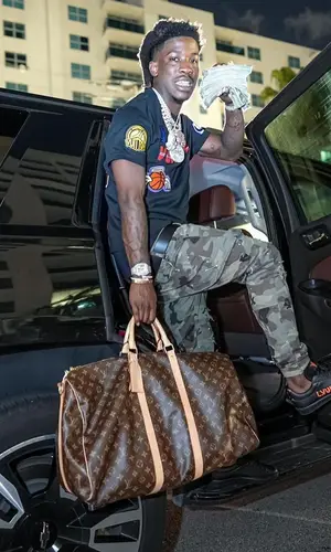 Hot Boii’s Outfit in NBA T-Shirt & Louis Vuitton Eyewear (2022)