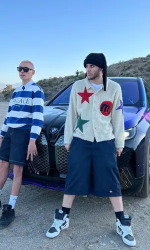 Evan Mock wearing Sorry sock