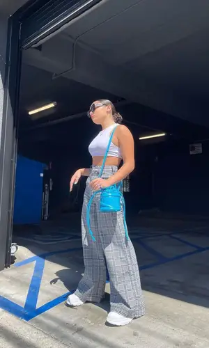 Avani Gregg wearing Alexander McQueen sneakers