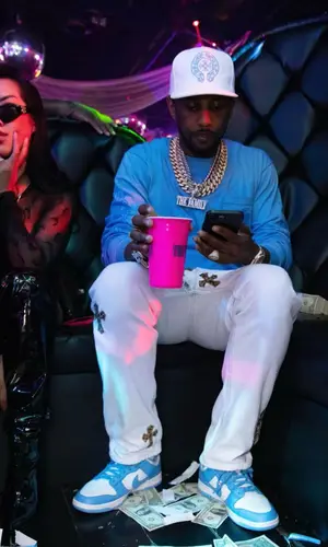 Fabolous wearing Chrome Hearts cap