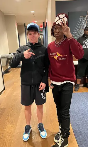 Lil Tecca wearing PrayForOurYouth hat