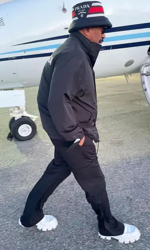 Steve Harvey wearing Prada hat